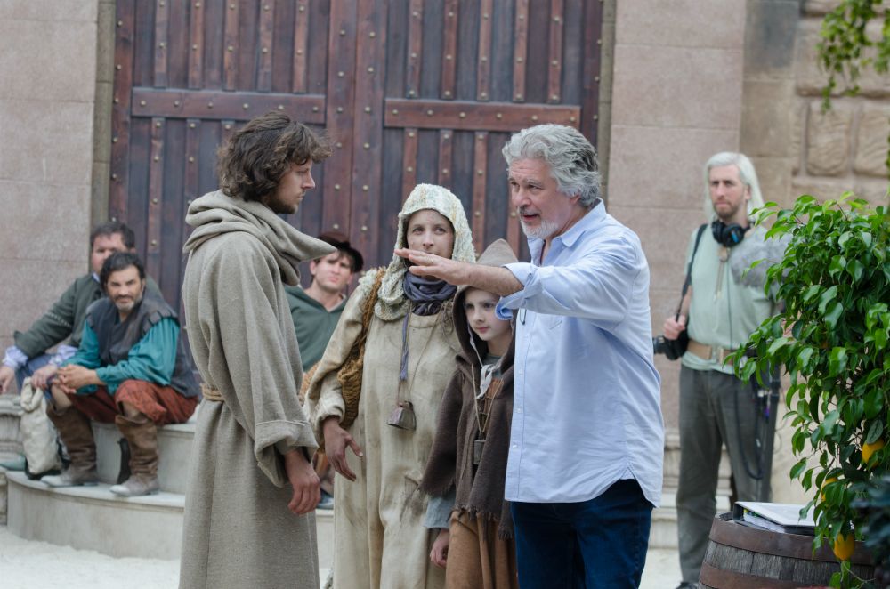 Director Alex Kronemer, right, works with Alexander McPherson, who plays St. Francis of Assisi in the documentary film "The Sultan and the Saint," which premieres on PBS Dec. 26. (UPF) Director Alex Kronemer, right, works with Alexander McPherson, who plays St. Francis of Assisi in the documentary film "The Sultan and the Saint," which premieres on PBS Dec. 26. (UPF)